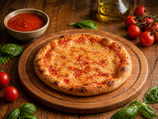 Masa de pizza a la piedra con salsa de tomate